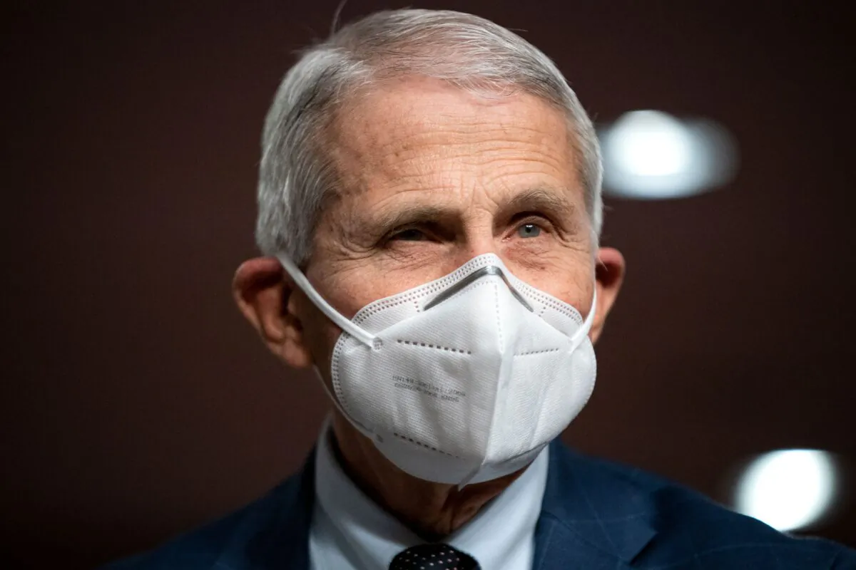 Dr. Anthony Fauci, chief medical adviser to President Joe Biden and the director of the National Institute of Allergy and Infectious Diseases, prepares to testify before a Senate panel in Washington on Jan. 11, 2022. (Greg Nash/Pool/AFP via Getty Images)