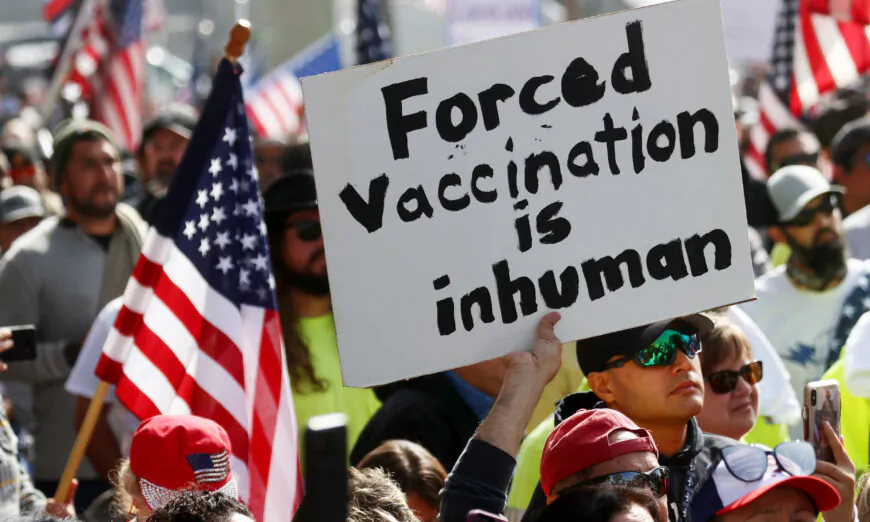 Protestors gather in Grand Park outside City Hall at a March for Freedom rally demonstrating against the Los Angeles City Council’s COVID-19 vaccine mandate for city employees and contractors, in Los Angeles, on Nov. 8, 2021. (Mario Tama/Getty Images)