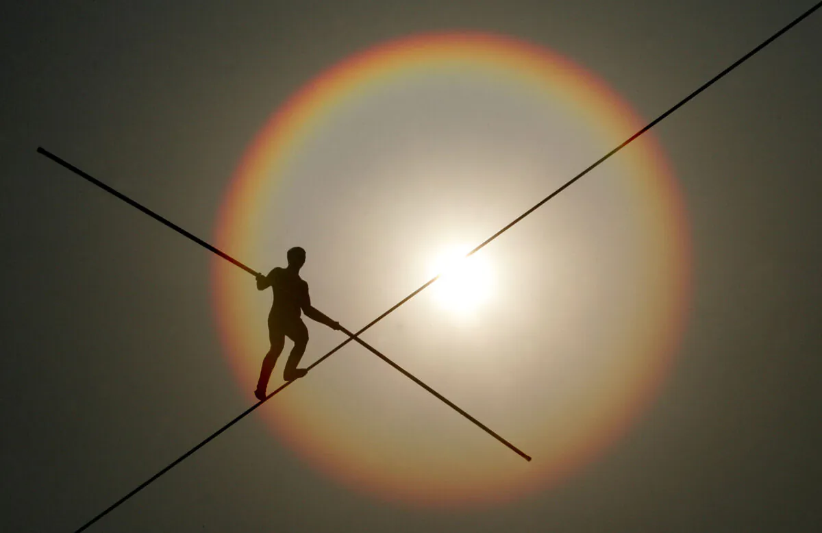 A file photo showing a participant in the first World High Wire Championships, over the HanGang River in Seoul, South Korea, on May 3, 2007. (Chung Sung-Jun/Getty Images)