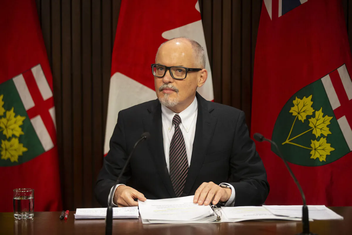 Dr. Kieran Moore, Ontario's chief medical officer, attends a media briefing in Toronto on Nov. 29, 2021. (Chris Young/The Canadian Press)