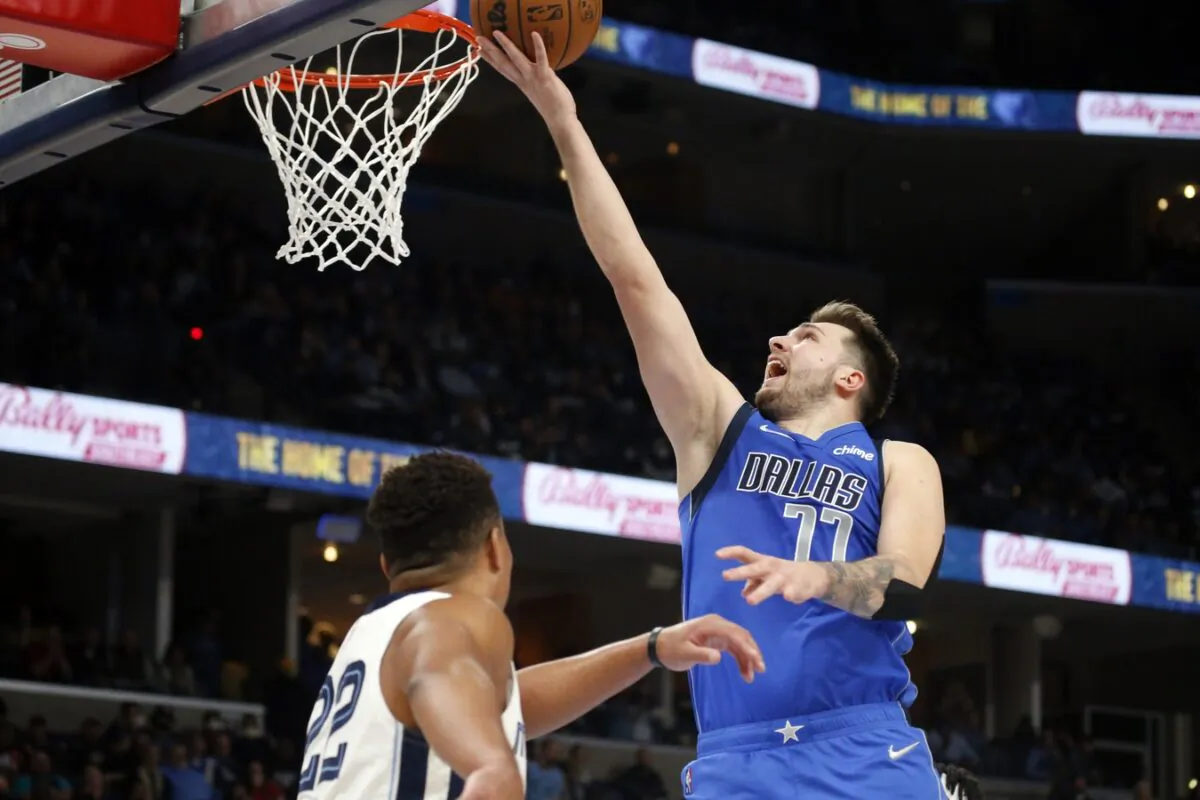 Dallas Mavericks guard Luka Doncic (77) shoots during the second half against the Memphis Grizzles at FedExForum, in Memphis, Tenn., on Jan. 14, 2022. (Petre Thomas/USA TODAY Sports via Field Level Media)