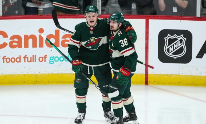 Minnesota Wild right wing Mats Zuccarello (36) celebrates with left wing Kirill Kaprizov (97) after scoring a goal against the Anaheim Ducks in the third period at Xcel Energy Center, in Saint Paul, Minn., on Jan. 14, 2022. (David Berding/USA TODAY Sports via Field Level Media)
