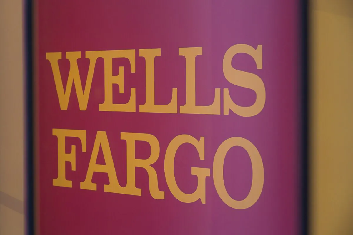 The Wells Fargo logo is seen inside a branch in Washington, on July 9, 2019. (Alastair Pike/AFP via Getty Images)