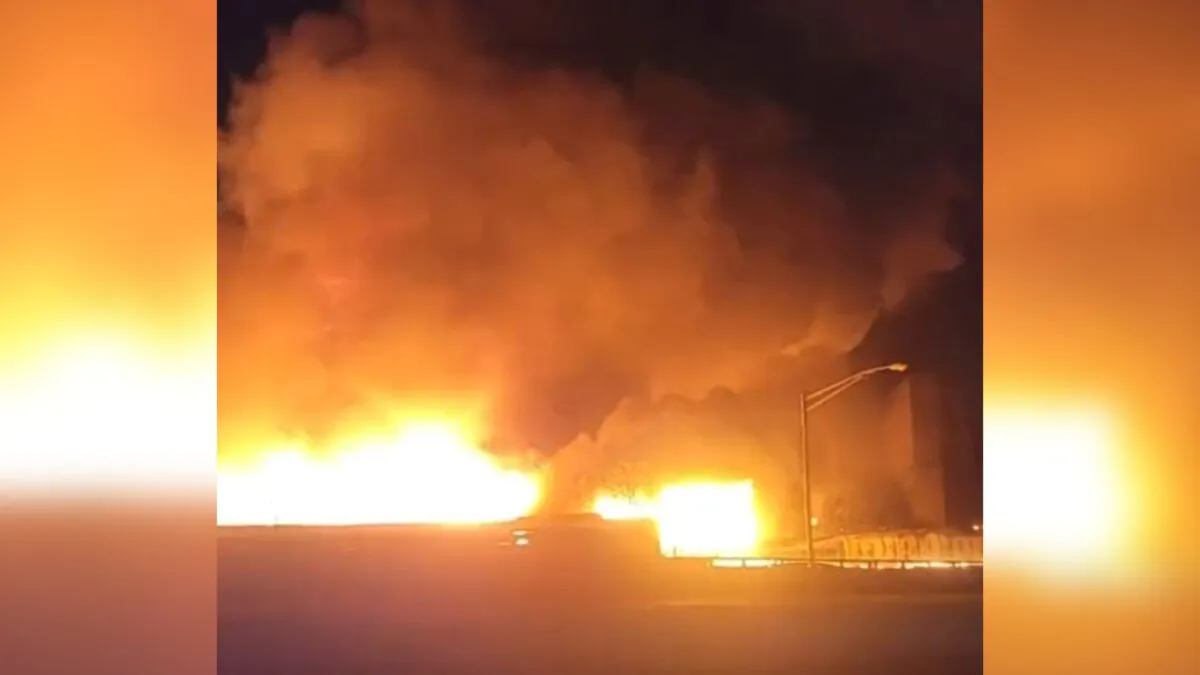 This image from video shows a fire near a New Jersey chemical plant, in Passaic, N.J., on Jan. 14, 2022. (Mikey B via AP)