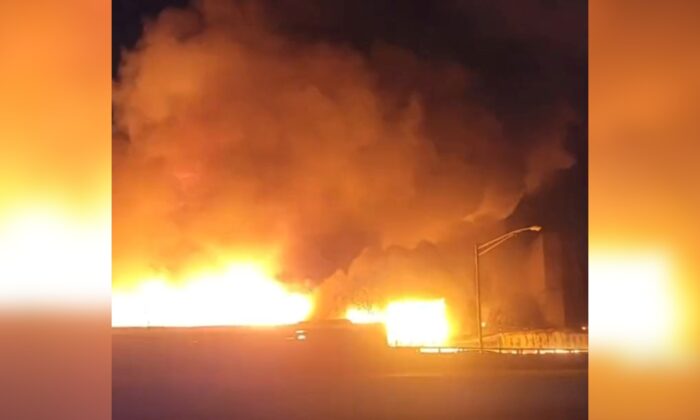 This image from video shows a fire near a New Jersey chemical plant, in Passaic, N.J., on Jan. 14, 2022. (Mikey B via AP)