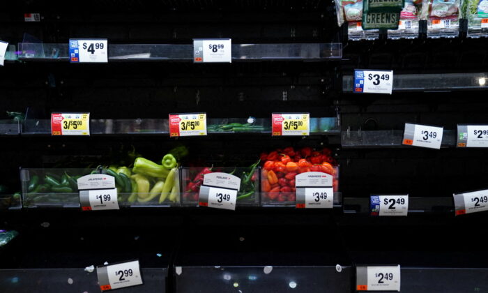 Produce shelves are seen nearly empty at a Giant Food grocery store, as the United States continues to experience supply chain disruptions, in Washington on Jan. 9, 2022. (Sarah Silbiger/Reuters)