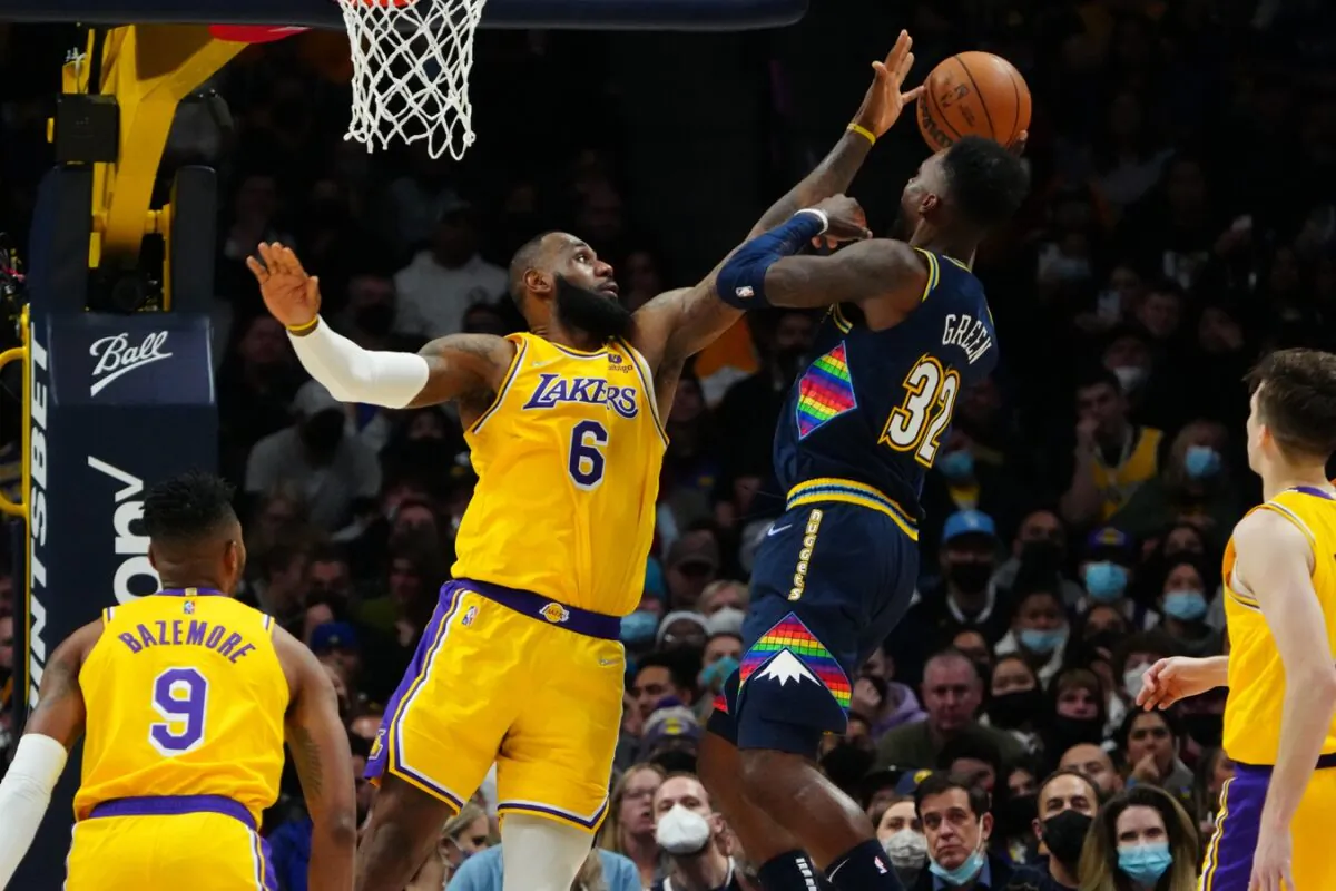 Los Angeles Lakers forward LeBron James (6) defends a shot by Denver Nuggets forward Jeff Green (32) in the second half at Ball Arena in Denver, on Jan. 15, 2022. (Ron Chenoy/USA TODAY Sports via Field Level Media)