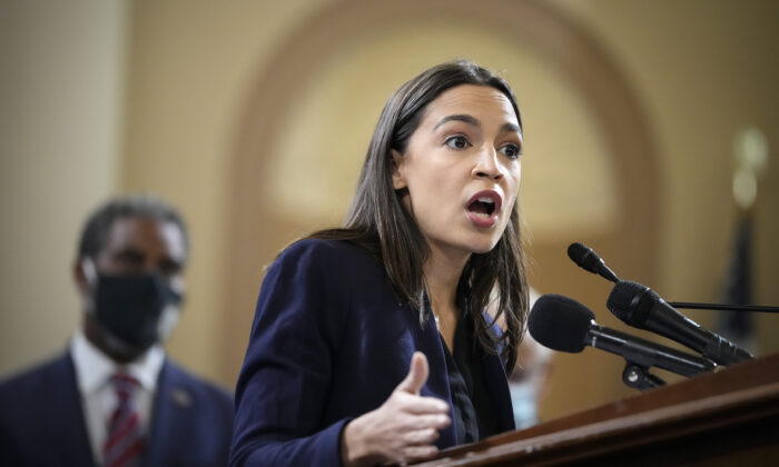 Rep. Alexandria Ocasio-Cortez (D-N.Y.) speaks during a news conference on Capitol Hill on Oct. 26, 2021. (Drew Angerer/Getty Images)