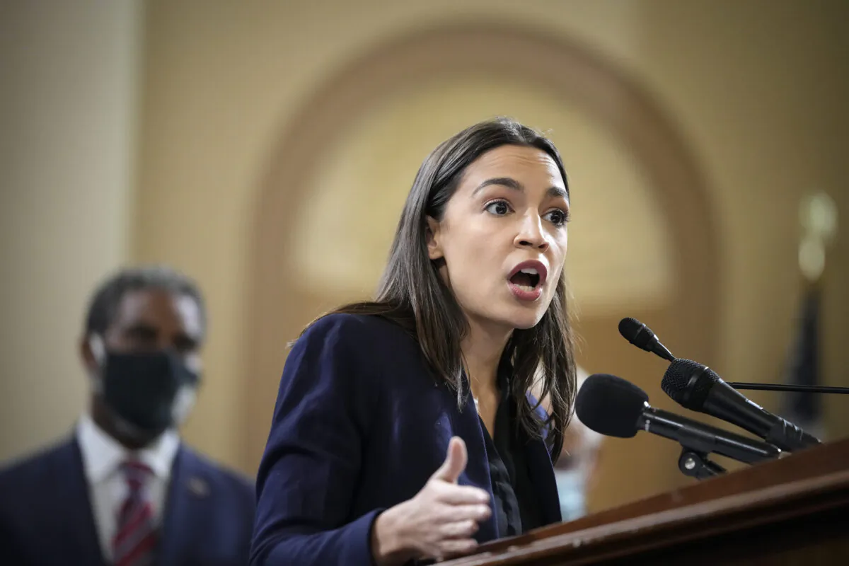 Rep. Alexandria Ocasio-Cortez (D-N.Y.) speaks during a news conference on Capitol Hill on Oct. 26, 2021. (Drew Angerer/Getty Images)