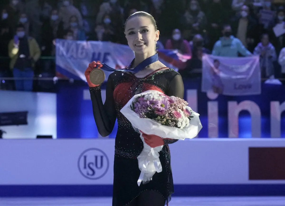 Russia's Kamila Valieva celebrates with gold medal after winning the ISU European Figure Skating Championships at Tondiraba Ice Hall in Tallinn, Estonia, on Jan. 15, 2022. (Ints Kalnins/Reuters)