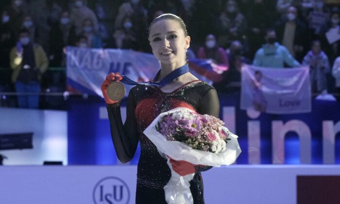 Russia's Kamila Valieva celebrates with gold medal after winning the ISU European Figure Skating Championships at Tondiraba Ice Hall in Tallinn, Estonia, on Jan. 15, 2022. (Ints Kalnins/Reuters)