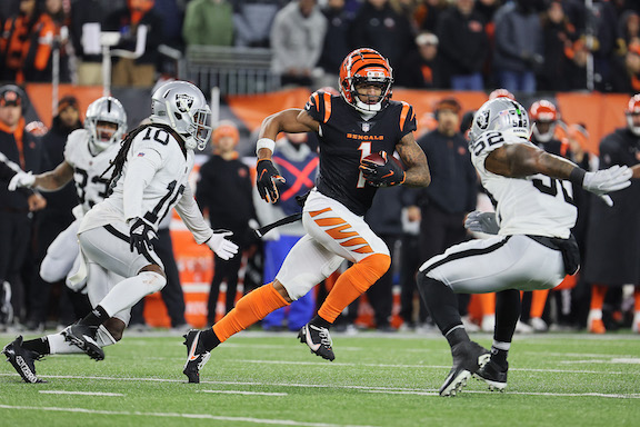 Wide receiver Ja'Marr Chase #1 of the Cincinnati Bengals runs with the ball against the Las Vegas Raiders during the second half of the AFC Wild Card playoff game at Paul Brown Stadium, in Cincinnati, on Jan. 15, 2022. (Andy Lyons/Getty Images)