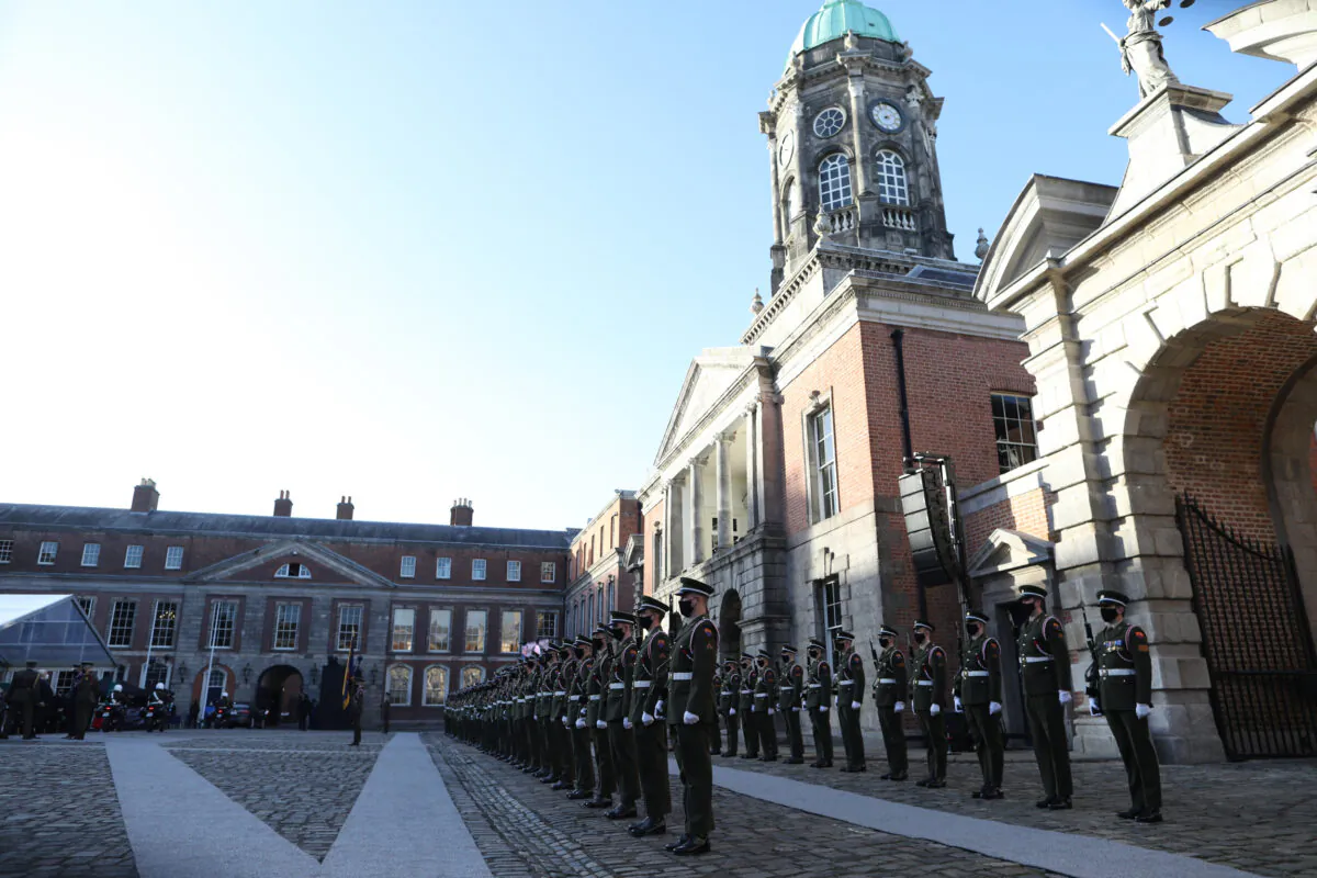 Handout photo of an Irish Defence Forces guard of honour during a ceremony to mark 100 years since the handover of Dublin Castle, on Jan. 16, 2022. (PA)