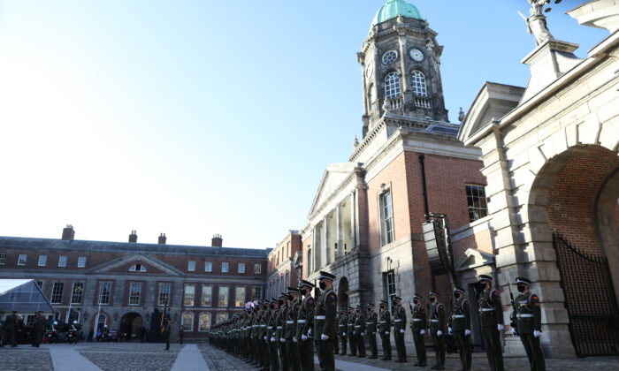 Handout photo of an Irish Defence Forces guard of honour during a ceremony to mark 100 years since the handover of Dublin Castle, on Jan. 16, 2022. (PA)