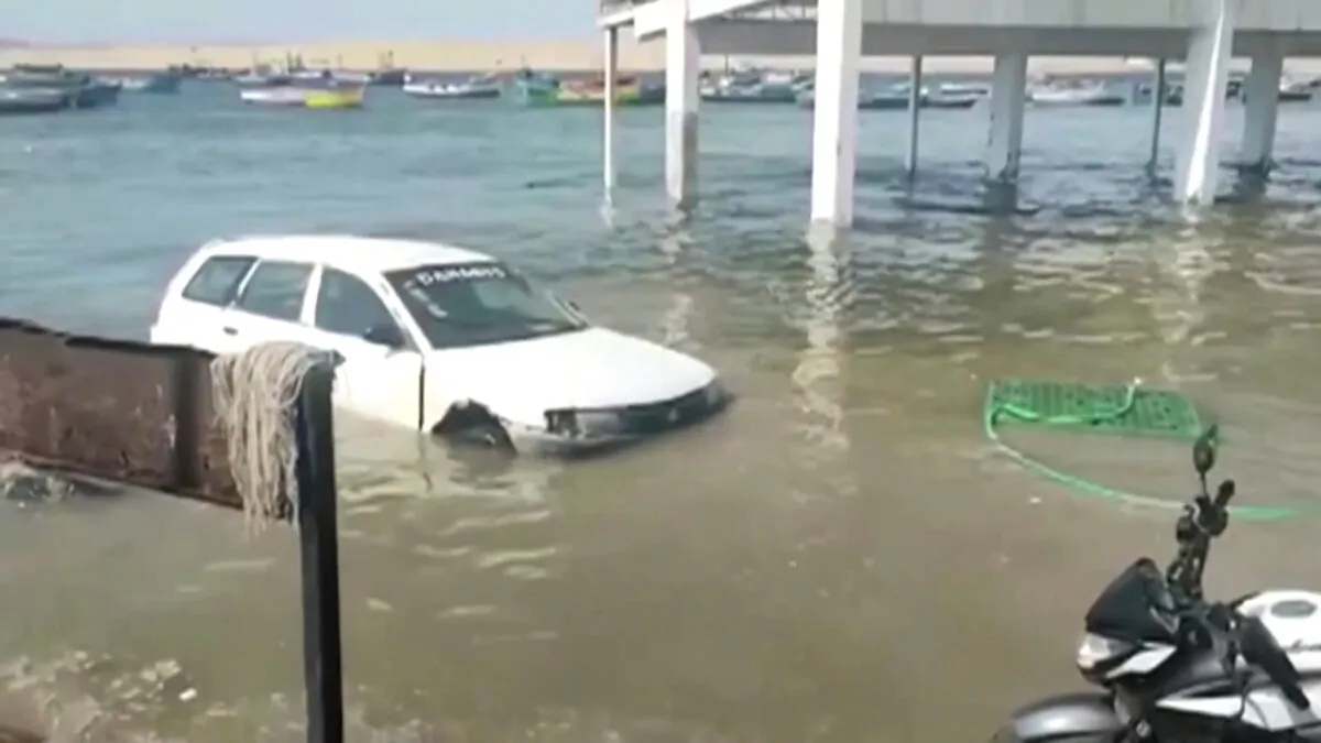 A flooded car in Pisco, Peru, on Jan. 15, 2022, in a still from a video. (Pisco te informa via Reuters/Screenshot via The Epoch Times)