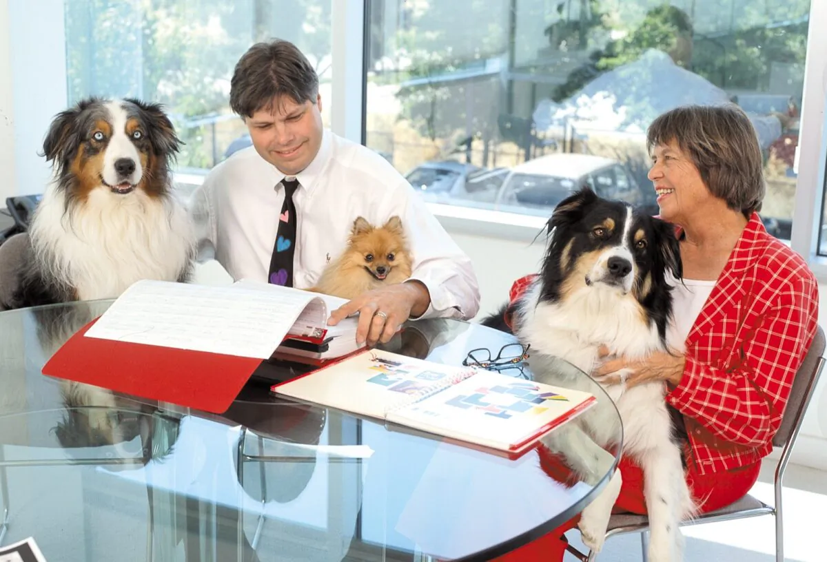 Jason Grossman and his mother, Andrea Grossman, with their dogs. (courtesy of Mrs. Grossman’s Paper Company)