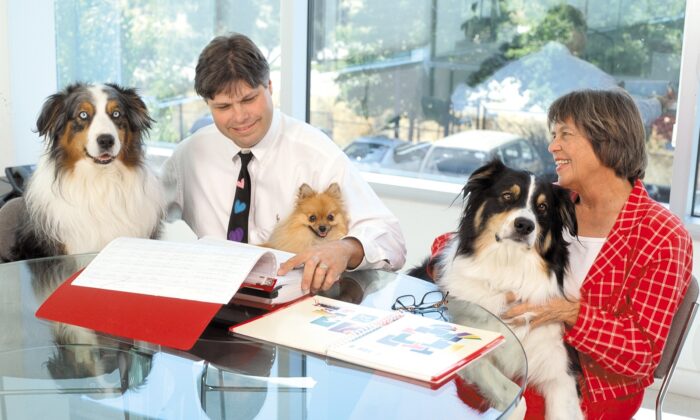 Jason Grossman and his mother, Andrea Grossman, with their dogs. (courtesy of Mrs. Grossman’s Paper Company)