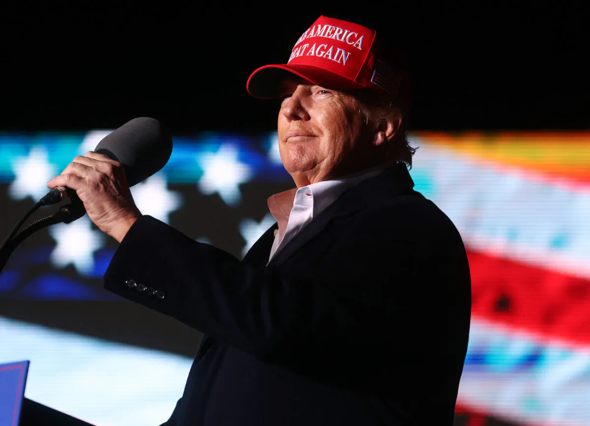 Former President Donald Trump prepares to speak at a rally at the Canyon Moon Ranch festival grounds in Florence, Arizona, on Jan. 15, 2022. (Mario Tama/Getty Images)