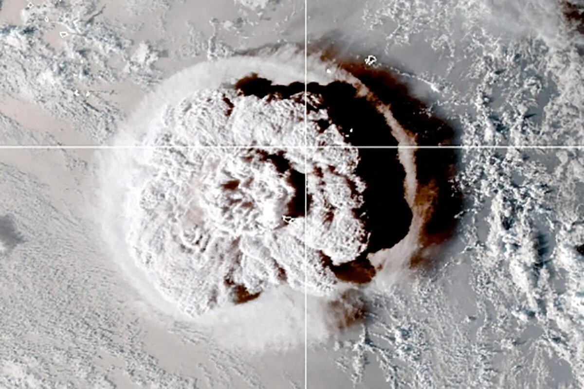 The eruption of an underwater volcano off Tonga, which triggered a tsunami warning for several South Pacific island nations, is seen in an image from the NOAA GOES-West satellite taken at 05:00 GMT on Jan. 15, 2022. (CIRA/NOAA/Handout via Reuters)