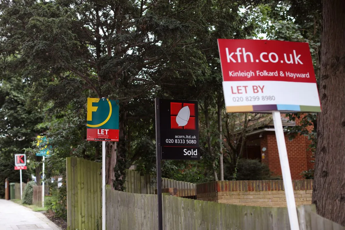 A for sale signs stands outside residential housing in London, on Aug. 10, 2017. (Dan Kitwood/Getty Images)