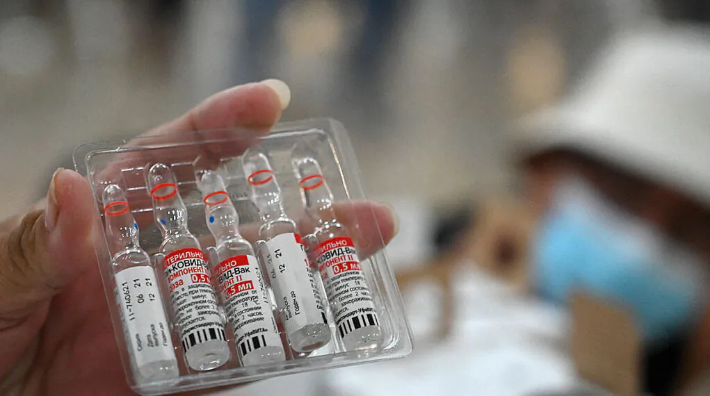 A nurse show vials of the Sputnik-V vaccine against COVID-19 at the Secretary of Foreign Affairs in Tegucigalpa, on August 19, 2021. (Orlando Sierra/ AFP via Getty Images)  