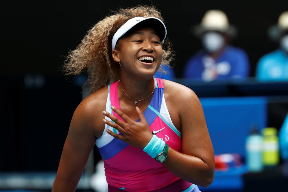 Naomi Osaka of Japan reacts during her first round match against Camila Osorio of Colombia at the Australian Open tennis championships in Melbourne, Australia, on Jan. 17, 2022. (Hamish Blair/AP Photo)