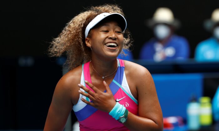Naomi Osaka of Japan reacts during her first round match against Camila Osorio of Colombia at the Australian Open tennis championships in Melbourne, Australia, on Jan. 17, 2022. (Hamish Blair/AP Photo)