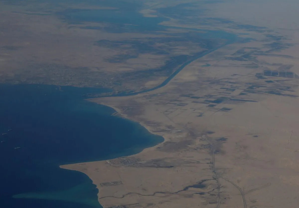 An aerial view of the Gulf of Suez and the Suez Canal are pictured through the window of an airplane on a flight between Cairo and Doha, Egypt, on Nov. 27, 2021. (Amr Abdallah Dalsh/Reuters)