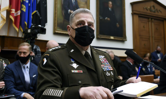 Chairman of the Joint Chiefs of Staff Gen. Mark A. Milley arrives to testify at a House Armed Services Committee hearing on the conclusion of military operations in Afghanistan at the Rayburn House Office building on Capitol Hill on Sept. 29, 2021.