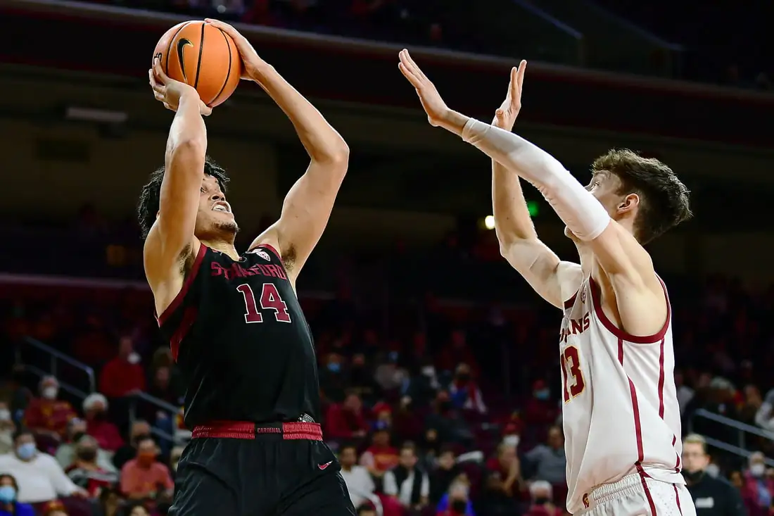 Stanford Cardinal forward Spencer Jones (14) shoots against Southern California Trojans guard Drew Peterson (13) during the second half at Galen Center, in Los Angeles on Jan 27, 2022. (Gary A. Vasquez/USA TODAY Sports via Field Level Media)