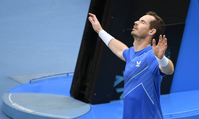 Andy Murray of Britain reacts, after defeating Nikoloz Basilashvili of Georgia in their first round match at the Australian Open tennis championships in Melbourne, on Jan. 18, 2022. (Andy Brownbill/AP Photo)