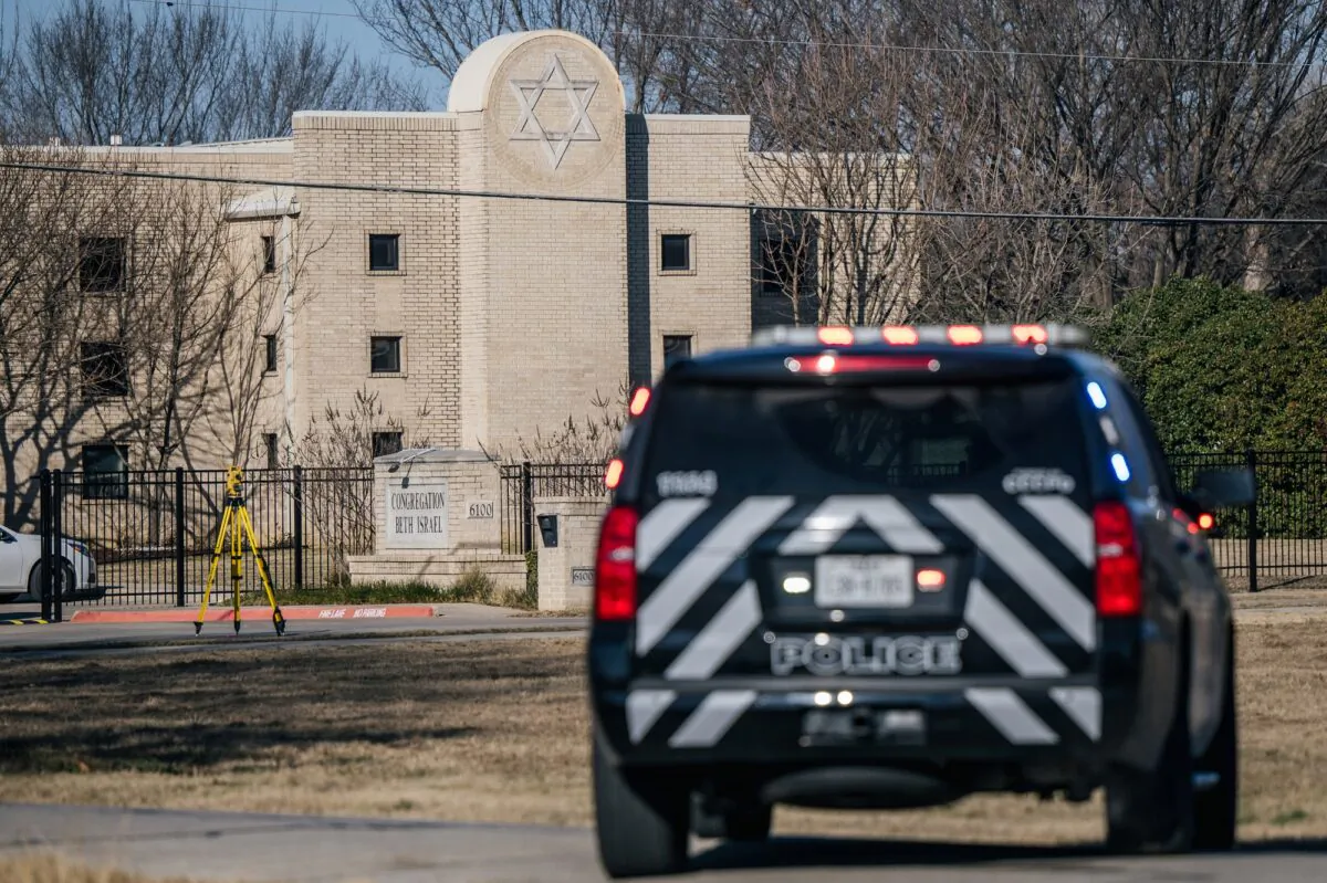 A law enforcement vehicle sits near the Congregation Beth Israel synagogue in Colleyville, Texas on Jan. 16, 2022. (Brandon Bell/Getty Images)