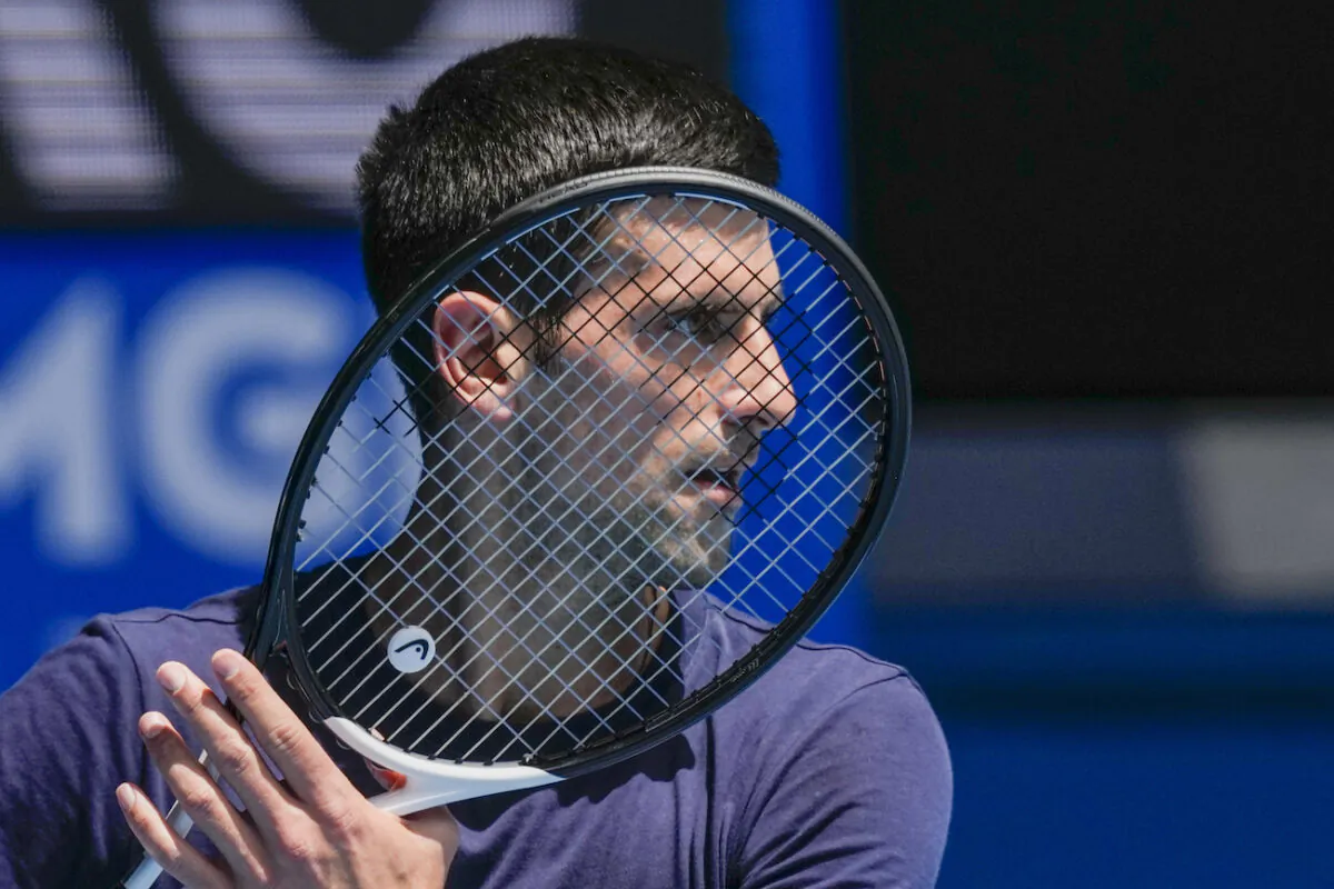 Novak Djokovic practices on Rod Laver Arena ahead of the Australian Open tennis championship in Melbourne, Australia, on Jan. 12, 2022. (AP Photo/Mark Baker)