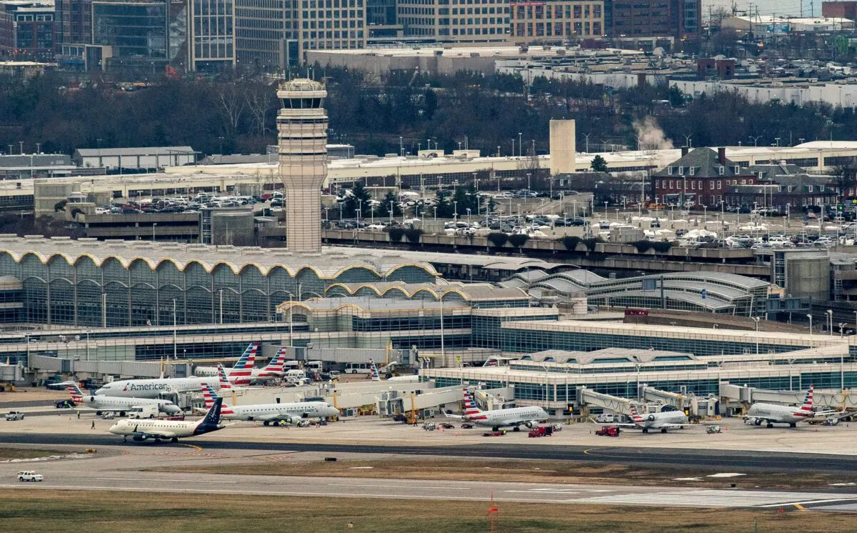 American Airlines and American Eagle planes sit at Ronald Reagan Washington National Airport in Arlington, Va., on Jan. 18, 2022. (Stefani Reynolds/AFP via Getty Images)
