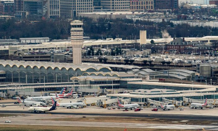 American Airlines and American Eagle planes sit at Ronald Reagan Washington National Airport in Arlington, Va., on Jan. 18, 2022. (Stefani Reynolds/AFP via Getty Images)