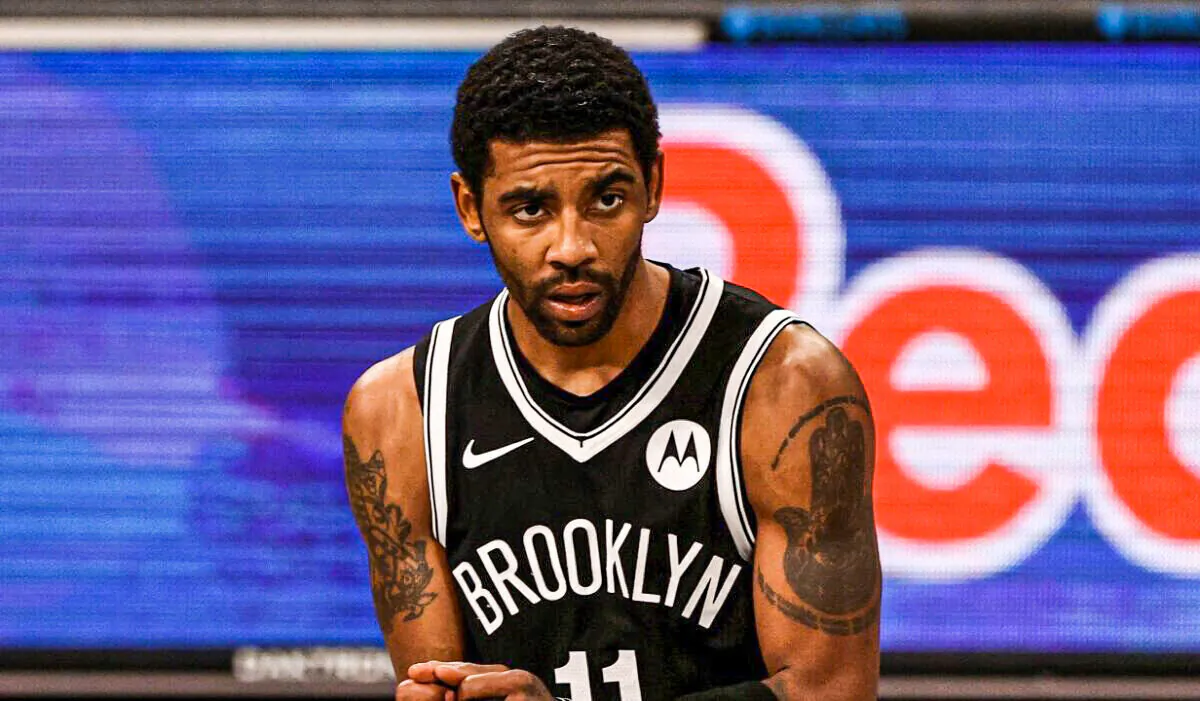 Kyrie Irving #11 of the Brooklyn Nets reacts in the second half against the Miami Heat at Barclays Center in New York City on Jan. 23, 2021. (Elsa/Getty Images)