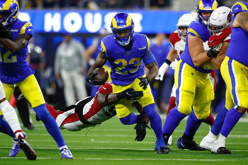 Cam Akers #23 of the Los Angeles Rams runs with the ball in the first quarter of the game against the Arizona Cardinals in the NFC Wild Card Playoff game at SoFi Stadium in Inglewood, Calif., on Jan. 17, 2022. (Harry How/Getty Images)