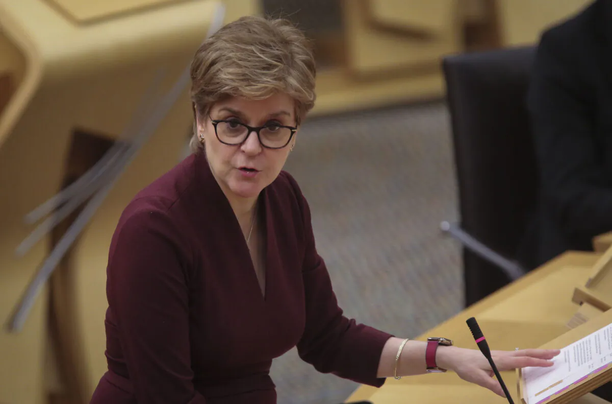 Scottish First Minister Nicola Sturgeon delivering a COVID-19 update statement in the main chamber at the Scottish Parliament, Edinburgh, on Jan. 18, 2022. (PA)