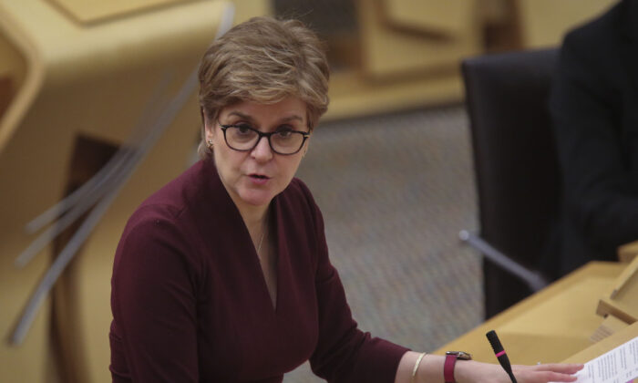 Scottish First Minister Nicola Sturgeon delivering a COVID-19 update statement in the main chamber at the Scottish Parliament, Edinburgh, on Jan. 18, 2022. (PA)