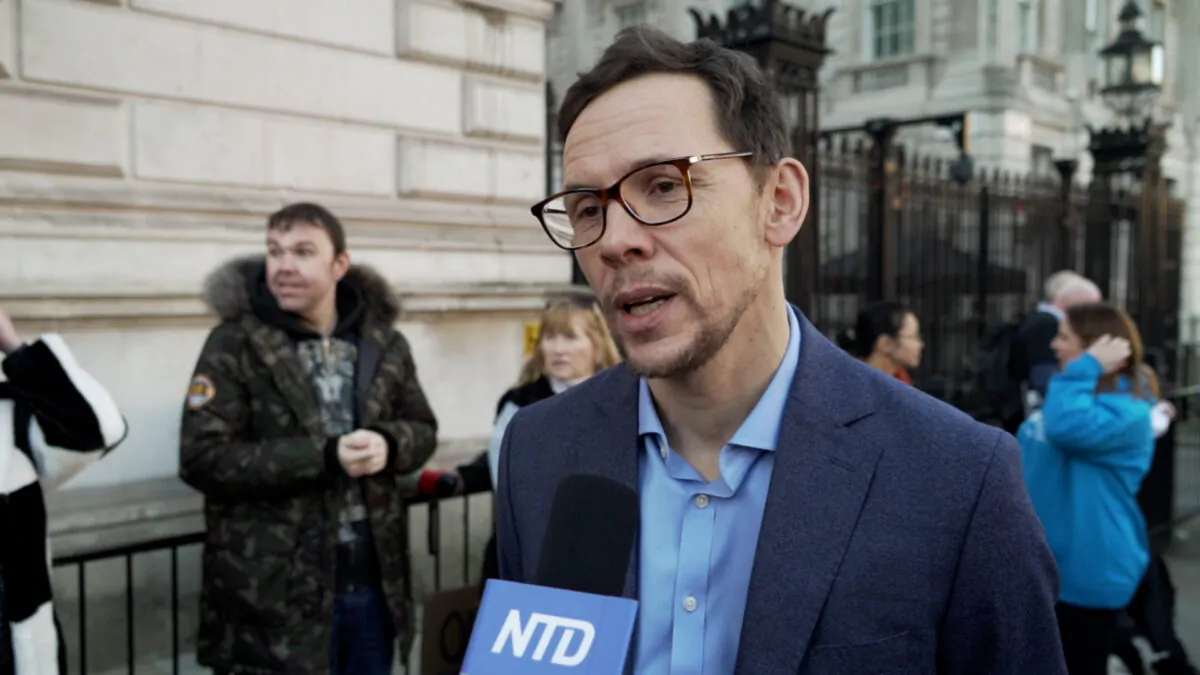 Steve James, consultant anesthetist at the King’s College Hospital, speaks to NTD outside No. 10, Downing Street, in London on Jan. 17, 2022. (Earl Rhodes/NTD)