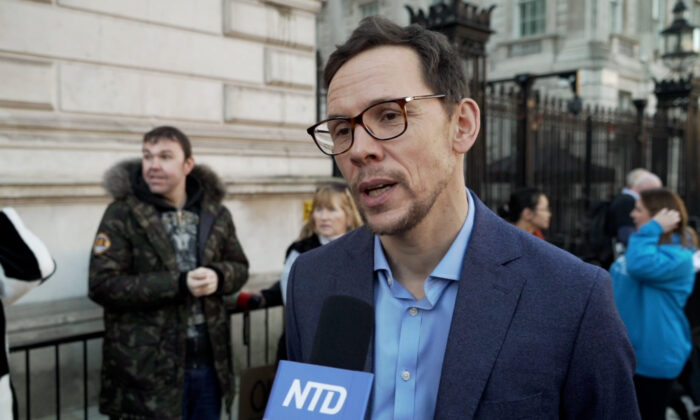 Steve James, consultant anesthetist at the King’s College Hospital, speaks to NTD outside No. 10, Downing Street, in London on Jan. 17, 2022. (Earl Rhodes/NTD)