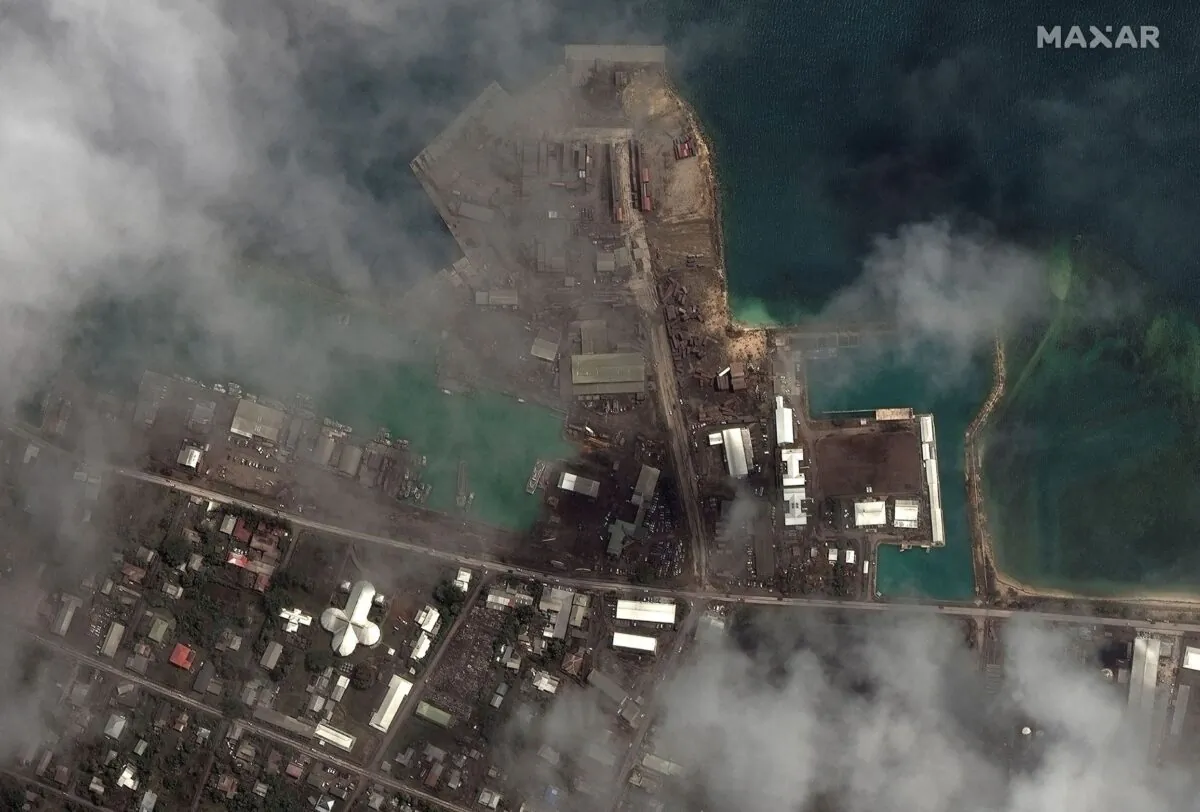 A satellite image shows the main port facilities after the main eruption of the Hunga Tonga-Hunga Ha'apai volcano, in Nuku'alofa, Tonga, on Jan. 18, 2022. (Satellite Image ©2022 Maxar Technologies/Handout via Reuters)