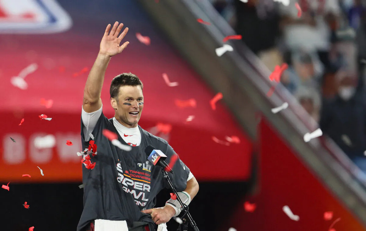 Tampa Bay Buccaneers quarterback Tom Brady (12) on the stage after defeating the Kansas City Chiefs in Super Bowl LV at Raymond James Stadium in Tampa, Fla., on Feb 7, 2021. (Matthew Emmons/USA TODAY Sports via AP)