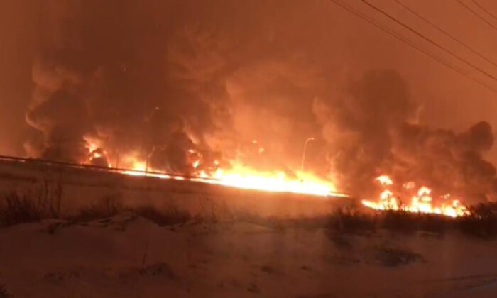 In this screenshot taken from a video, smoke rises from an oil pipeline near the town of Pazarcik in the Kahramanmaras Province, Turkey, on Jan. 18, 2022. (IHA agency via AP)