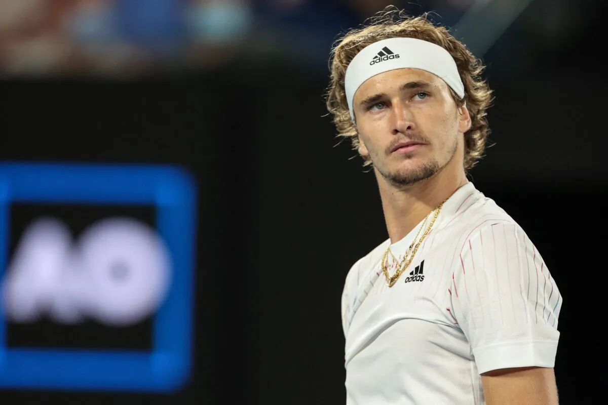 Germany's Alexander Zverev looks on as he plays against Australia's John Millman during their men's singles match on day three of the Australian Open tennis tournament in Melbourne, on Jan. 19, 2022. (Martin Keep/AFP via Getty Images)