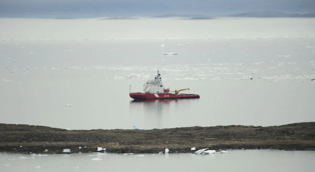 A Canadian Coast Guard vessel sits off the coastline of Iqaluit on Aug. 2, 2019. (The Canadian Press/Sean Kilpatrick)