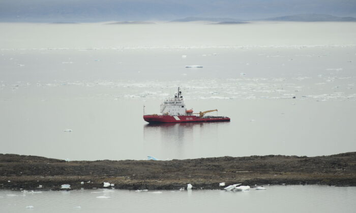 A Canadian Coast Guard vessel sits off the coastline of Iqaluit on Aug. 2, 2019. (The Canadian Press/Sean Kilpatrick)