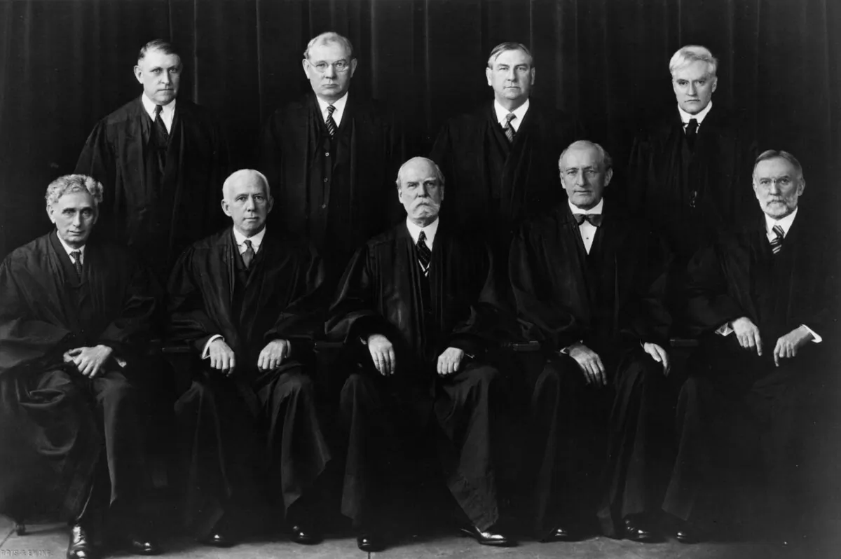 The members of the U.S. Supreme Court in 1937. Front row (L-R) Associate Justices Louis Brandeis and Willis Van Devanter; Chief Justice Charles Evans Hughes; Associate Justices James Clark McReynolds and George Sutherland. Back row (L-R) Associate Justices Owen Roberts, Pierce Butler, Harlan Fiske Stone, and Benjamin Cardozo. (MPI/Getty Images)