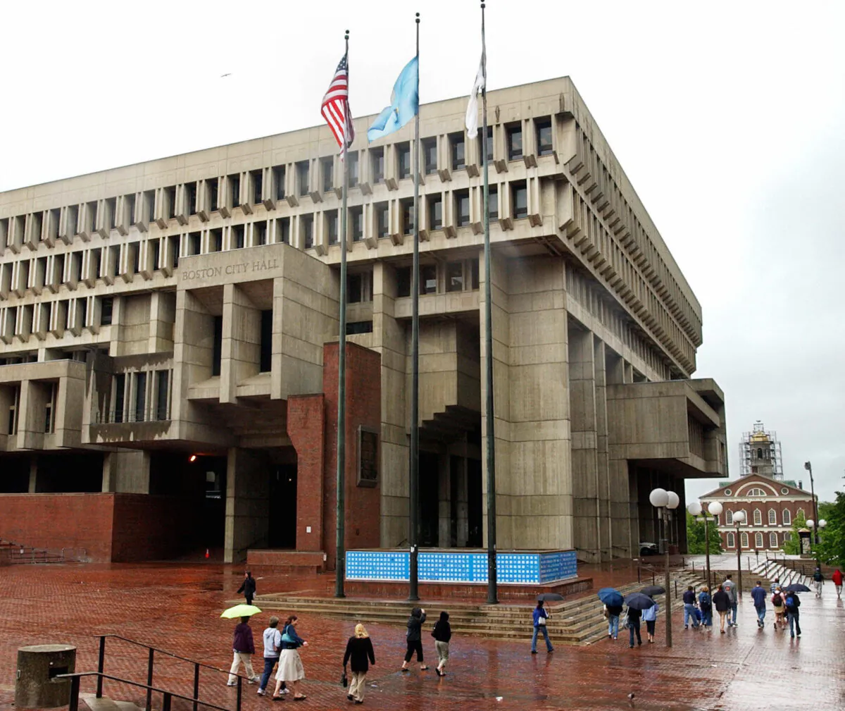 Boston City Hall and the historic Fanueil Hall (R) on May 16, 2004. (Stan Honda/AFP via Getty Images)