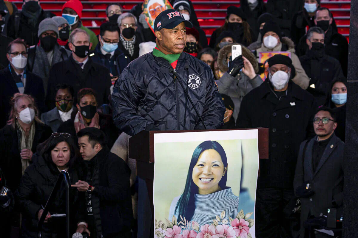 New York City Mayor Eric Adams speaks during the candlelight vigil in honor of Michelle Alyssa Go, a victim of subway attack, at Times Square in New York, on Jan. 18, 2022. (Yuki Iwamura/AP Photo)